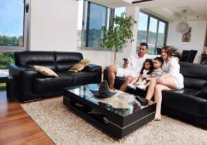 Family enjoying their living room and underfloor heating