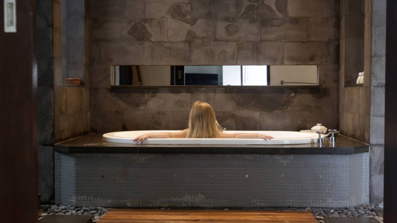 Underfloor heating installed beneath bathroom tiles