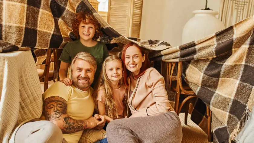 Family in living room with floor heating